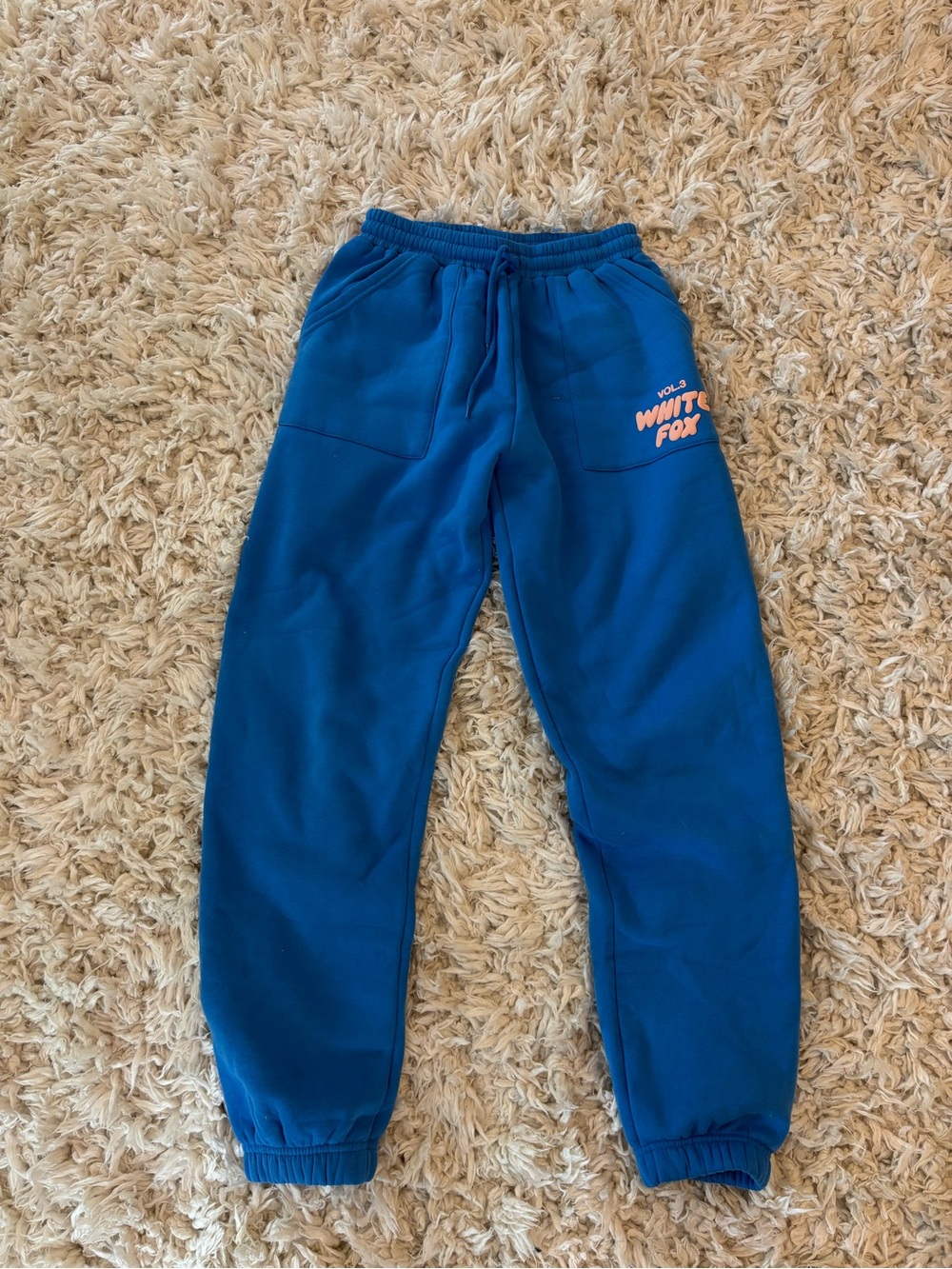 White Fox Boutique Blue Track Joggers with Pink Logo